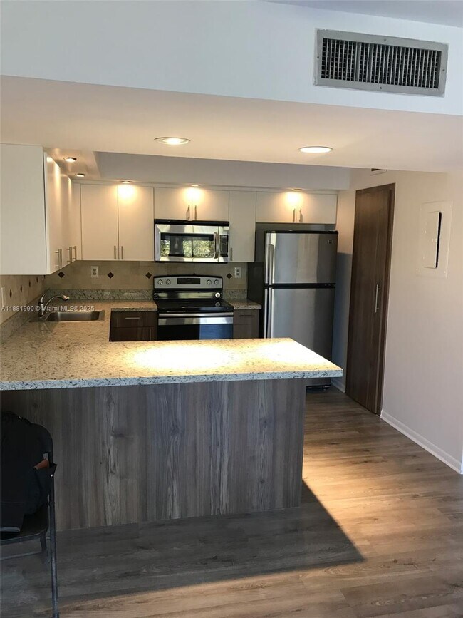 Photo - 8811 SW 132nd Pl Unit 401CW