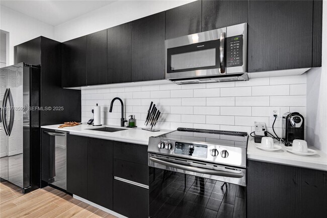 Photo - 398 NE 5th St Unidad 3419