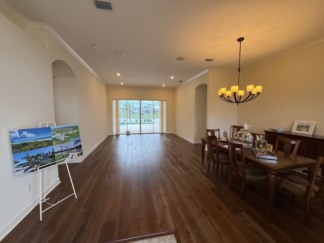 Photo - Luxurious 4 Bedroom 3 Bath Lakefront Pool Home W/3-Car Garage