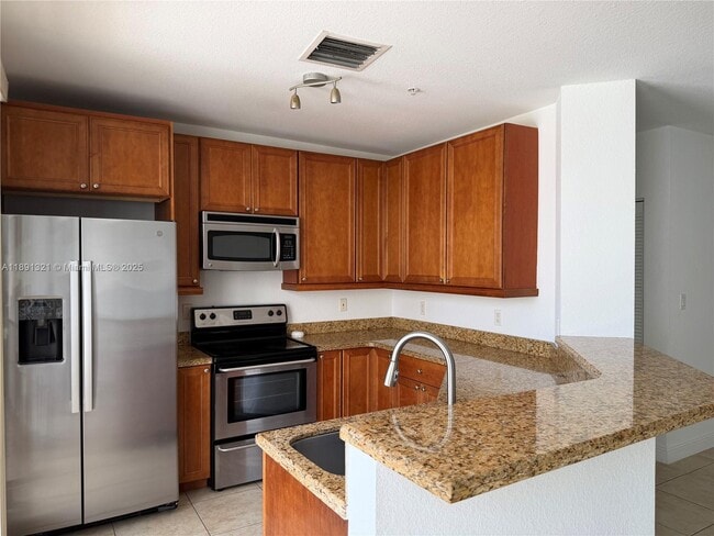 Building Photo - 107 Mendoza Ave Unit 402