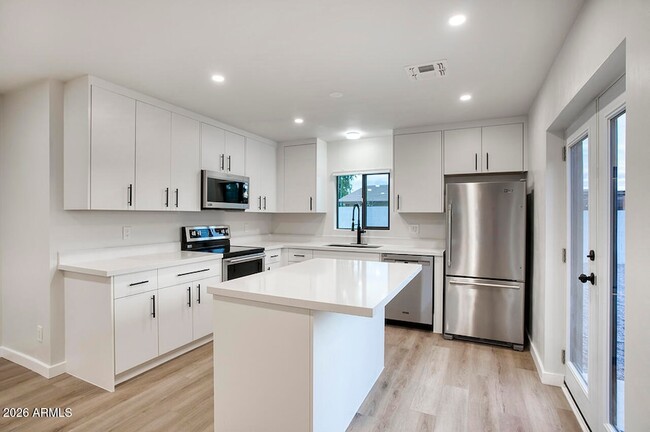 Photo - 8015 W Roma Ave