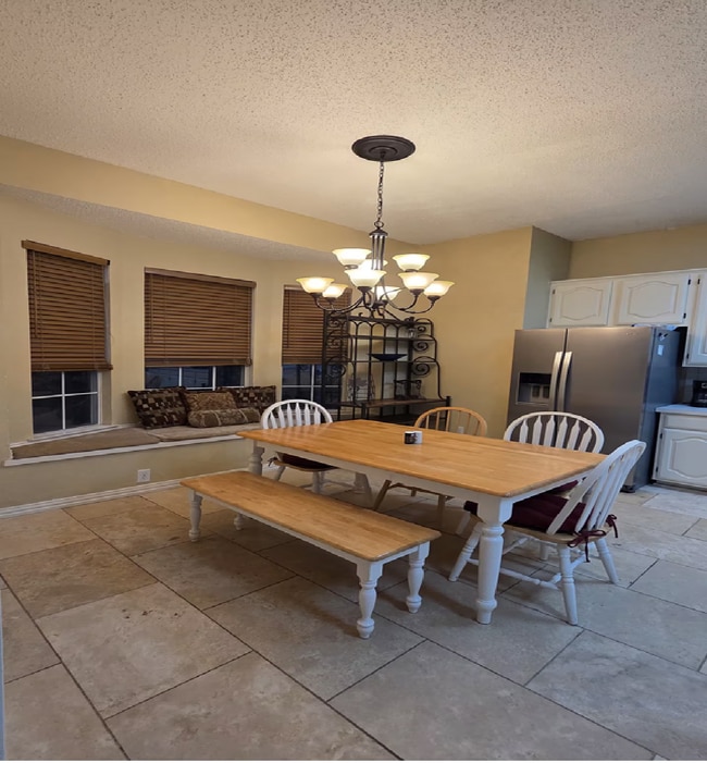 Gather with your family in the refined comfort of an inviting kitchen
