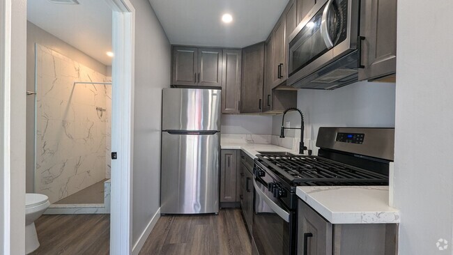 Building Photo - Fenced Private Yard in Newer Build Studio ... Unit 6736 Thomson Court Rental