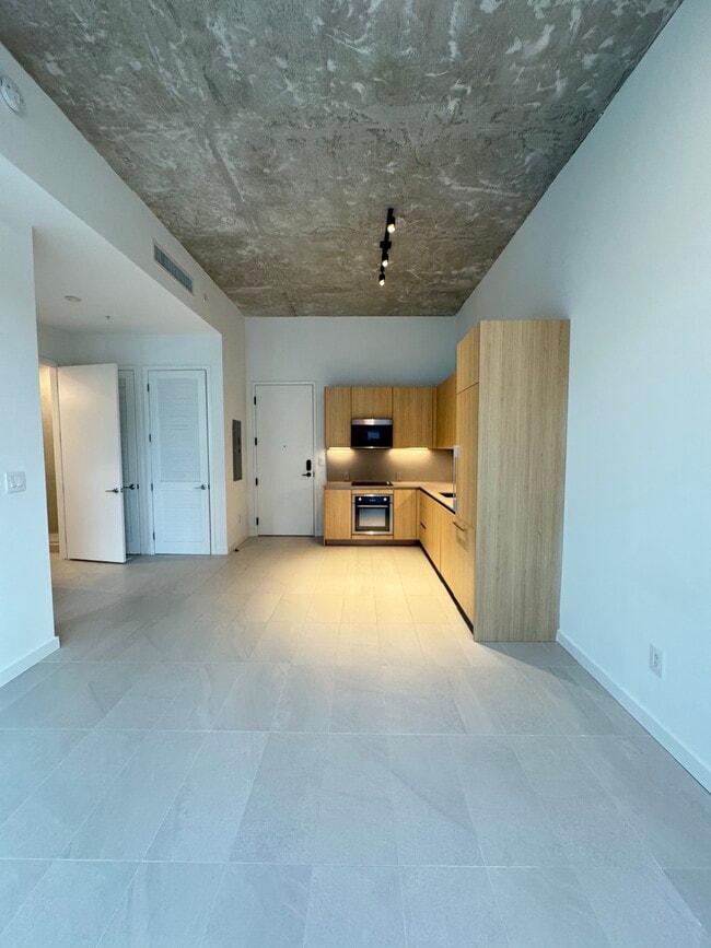 KITCHEN FROM LIVING ROOM - 112 NW 31st St Unit A2