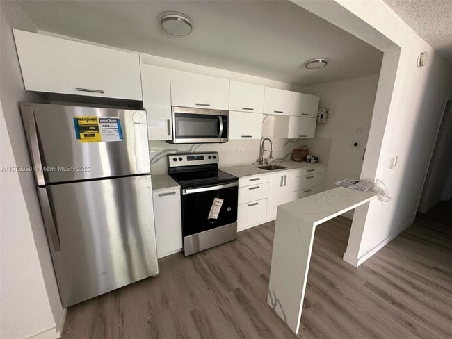 Building Photo - 4174 NW 79th Ave Unit 1A