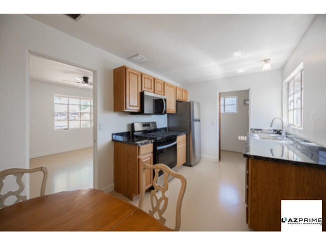 Photo - Welcome to this Charming 2/1 Phoenix Duplex Unit!