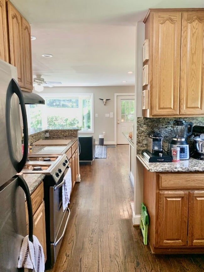 Photo - Light filled 2 BR plus 2 rooms, 2 FB including one in finished basement. Great location