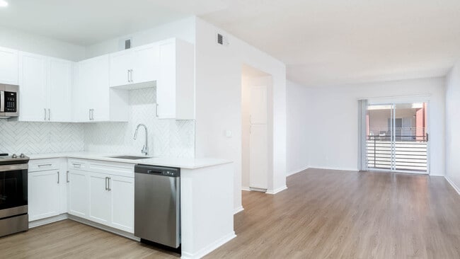 Living Room with Balcony and Hard Surface Flooring