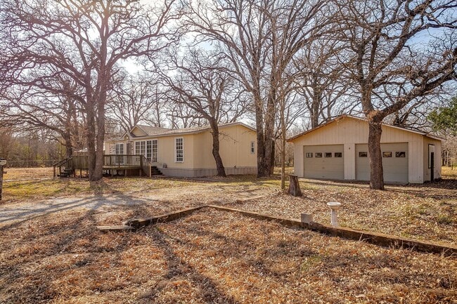 Photo - Large 3 Bedroom, 2 Bath Doublewide on 1/2 an Acre- Carport with Garage- Ready for New Tenants- Bu...