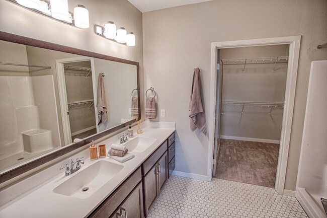 Spacious Bathrooms with custom tile