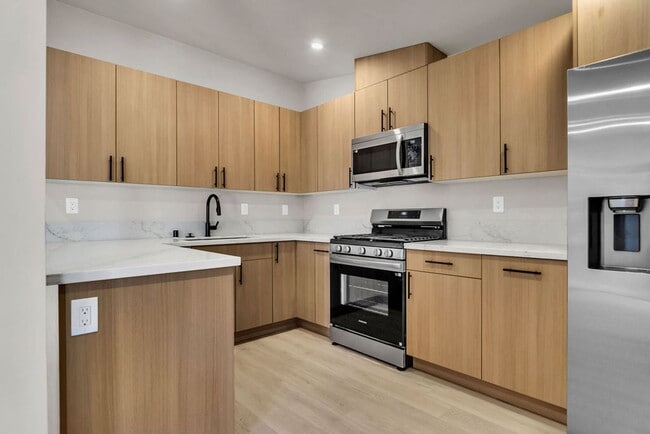 Building Photo - Brand new 2 bed 1 bath with washer/dryer i... Rental