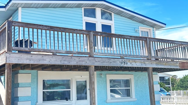 Building Photo - Right Across from the Beach!!