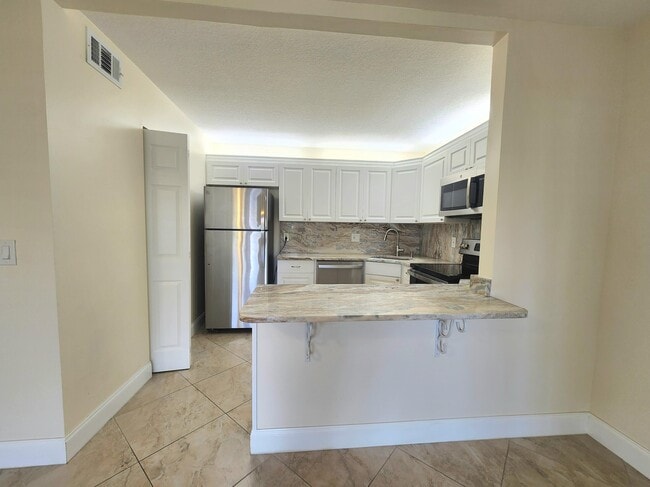 Photo - 310 Knotty Pine Cir Unit A-1