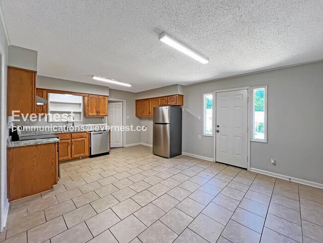 Photo - 4 Bed, 1.5 Bath Home with Fenced Yard / Pet-Friendly / Coming Soon!