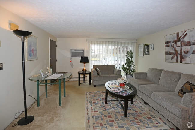 Sala de estar - Camelot Court Apartments