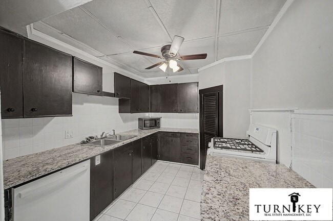 Building Photo - Spacious 2BR/2BA on the Bricks — Walk to Lucile's & the Cultural District Unit 4800 Bryce Ave #1