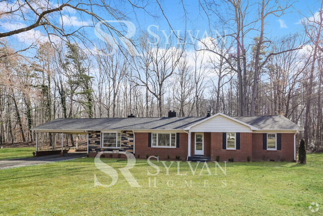 Building Photo - Nice brick home with beautiful curb appeal