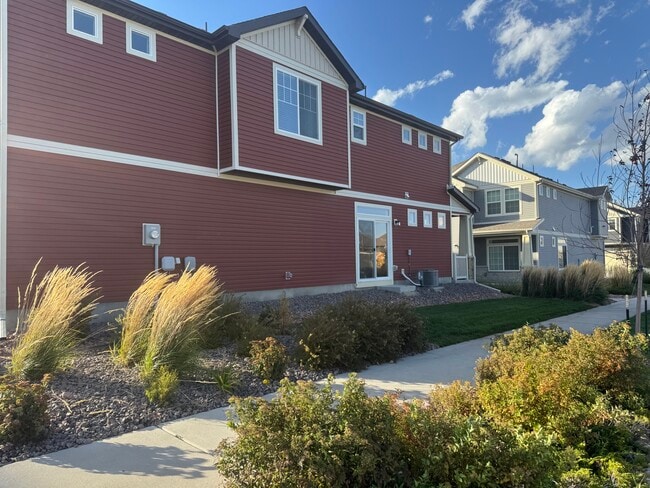 9278 Turlough side yard faces East. Patio door brings in morning light. - 9278 Turlough Hts