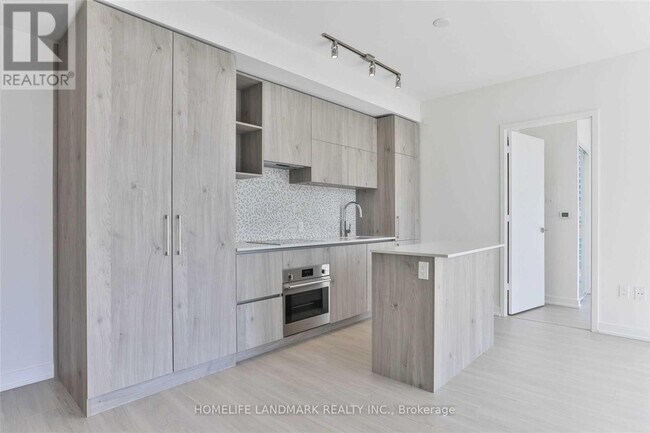 Photo - 1 Yorkville Ave Unité 1202