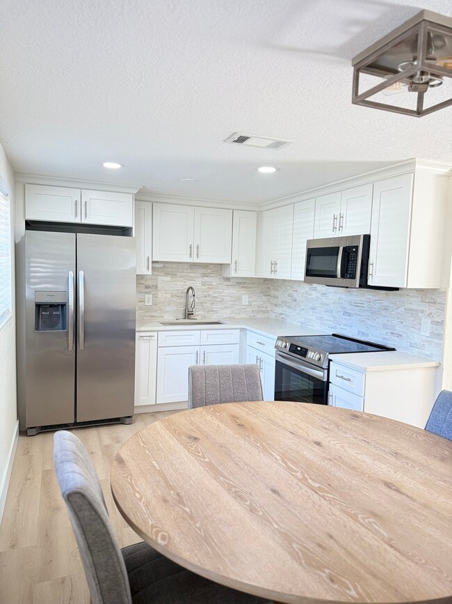 Photo - 8114 N Newport Ave