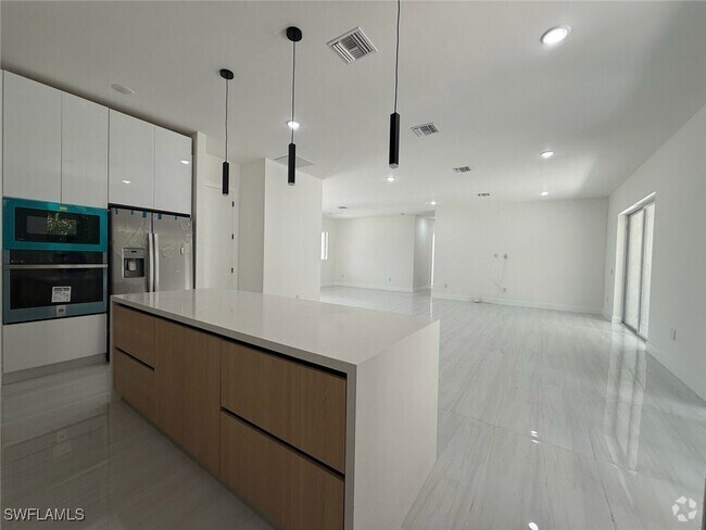 Building Photo - 1549 NW 26th Pl Rental