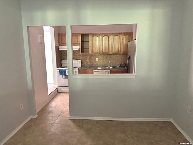 Photo - 13-35-35 Bell Blvd Unit 1 FL