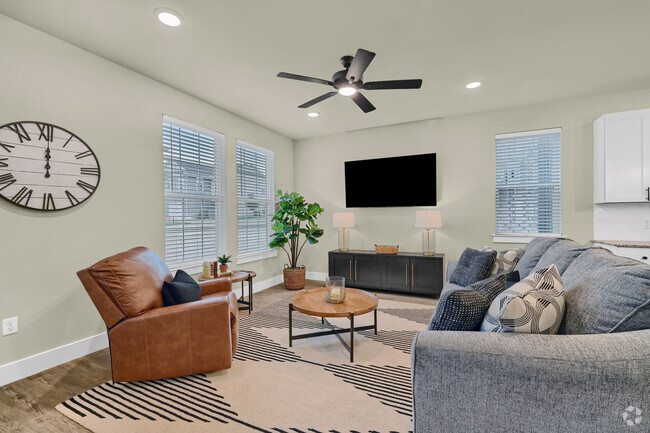 Family Room - Heritage Court Luxury Townhomes *Now Open