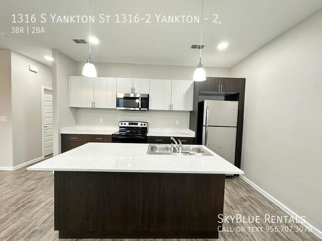 Building Photo - 1316 S Yankton St Unit 2,