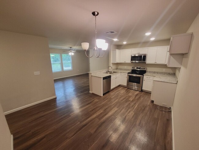 Photo - 3 bed 2 bath 2 car garage with fenced back yard.