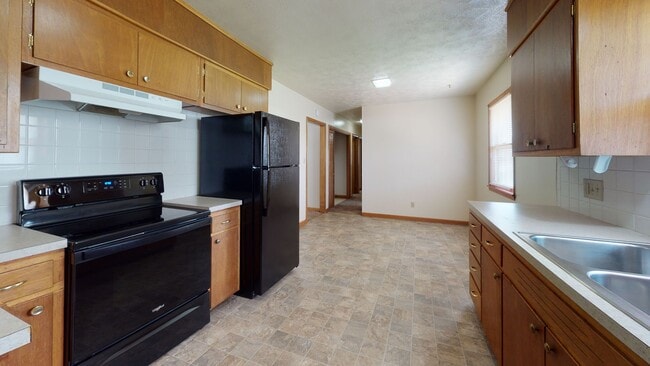 Photo - 3 Bedroom, 1.5 Bathroom House with Attached Garage