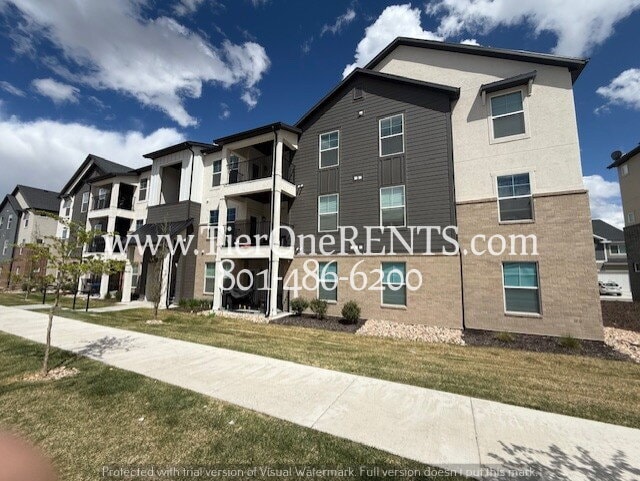 Building Photo - NO DEPOSIT option for qualified renters Unit R202