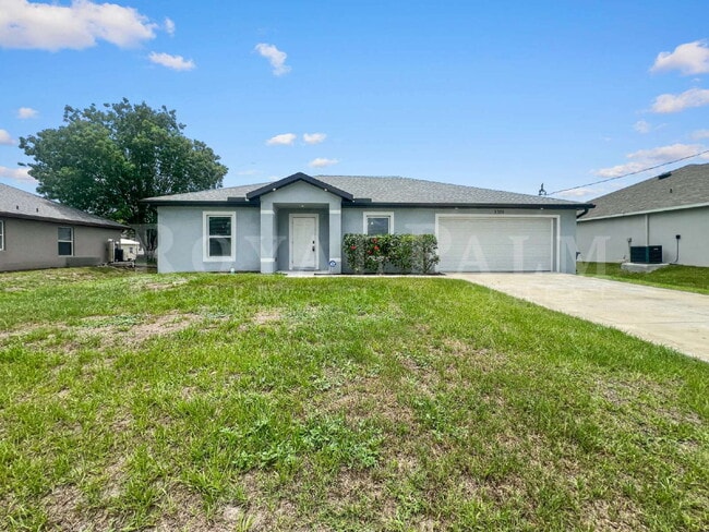 Building Photo - 4BR/2BA Home with High Ceilings, Garage & Large Kitchen Island