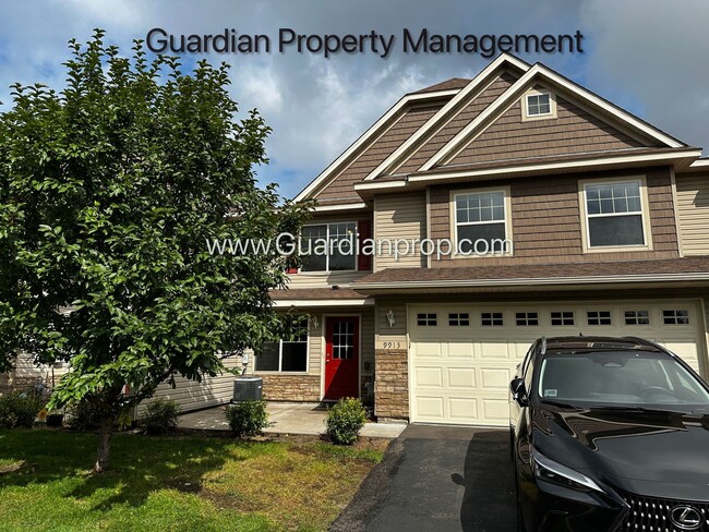 Building Photo - Brooklyn Park Town Home, 2 Car Garage, Dis...