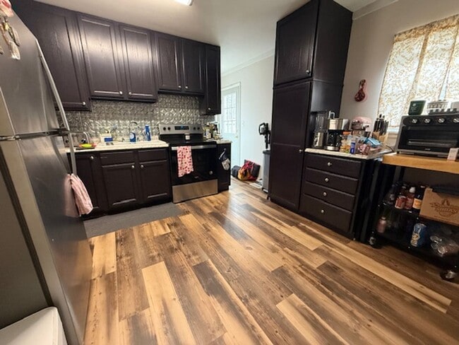 Photo - 3-Bedroom Home with Fenced Backyard