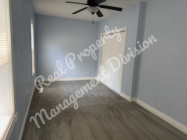 Photo - Spacious 3-Bed, 2-Bath Home with Fenced Yard in a Quiet Neighborhood
