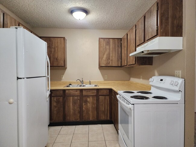Photo - 7938 NW Crossland Cir Unidad 7938