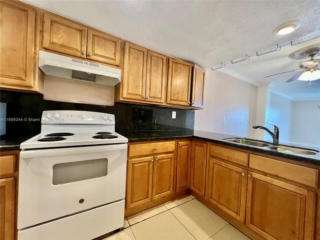 Photo - 9915 W Okeechobee Rd Unit 2-506