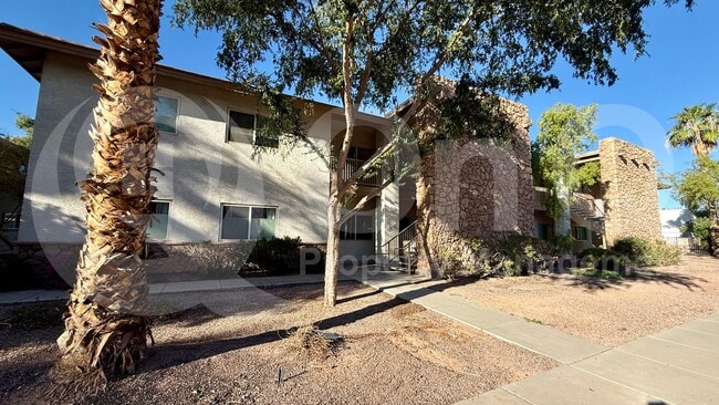 Building Photo - 6920 E 4th St Unit 209