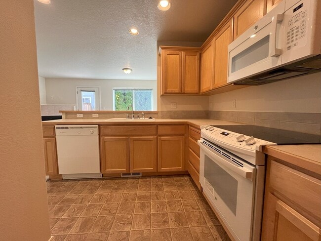Photo - Welcome to this charming 3-bedroom, 3-bathroom home in Forest Grove!
