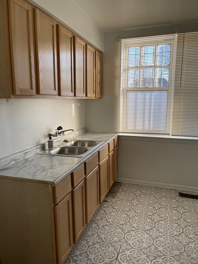 Building Photo - 5300 Mitchell St Unit Lower front west