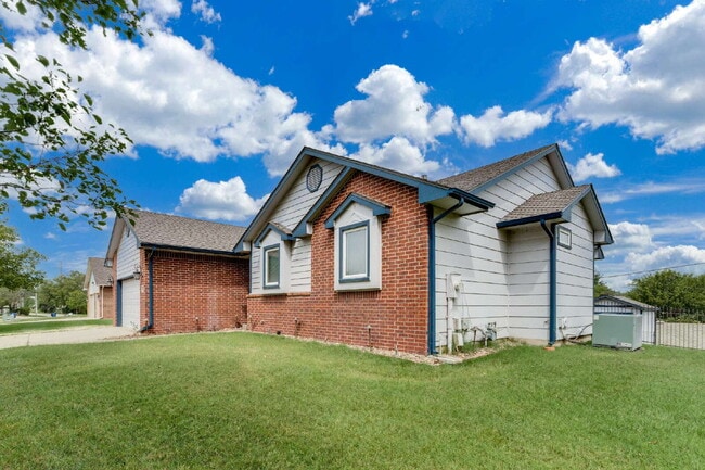 "Spacious 4-Bedroom Retreat with 3 Full Baths in Prime Wichita Location – 2,812 Sq. Ft.!"

Hurry!...