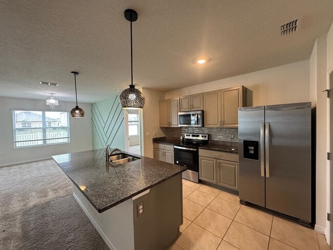 Photo - 3BD/2BA Modern Florida Home Living Reimagined — Solar-Powered Elegance Near I-95 in Edgewater! FU...