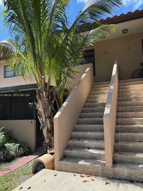 Building Photo - 9050 Jacaranda Ln Unit 8