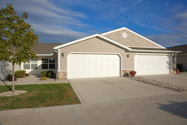 Attached Garages in a Welcoming Neighborhood Setting - Redwood Brunswick Apartments