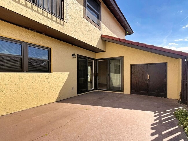 Photo - Spanish-Style 3 Bedroom, 2.5 Bath Mediterranean Rooftop Townhouse – Basic Cable & Wi-Fi Included!