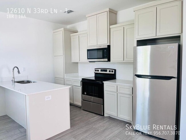 Building Photo - 12610 N 33rd Ln Unit 1