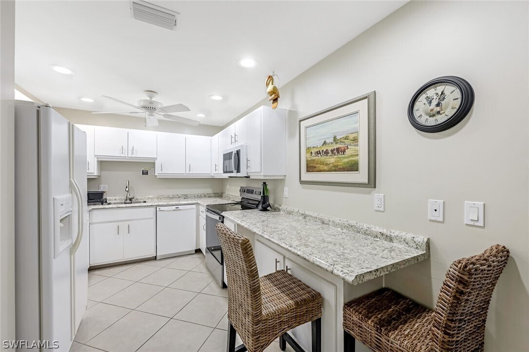 Photo - 509 Roma Ct Unit 202
