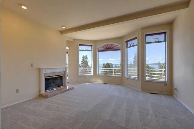 Photo - 4+ Bedroom with Great Entertaining Wrap Around Decks with VIEW of PUGET SOUND!!