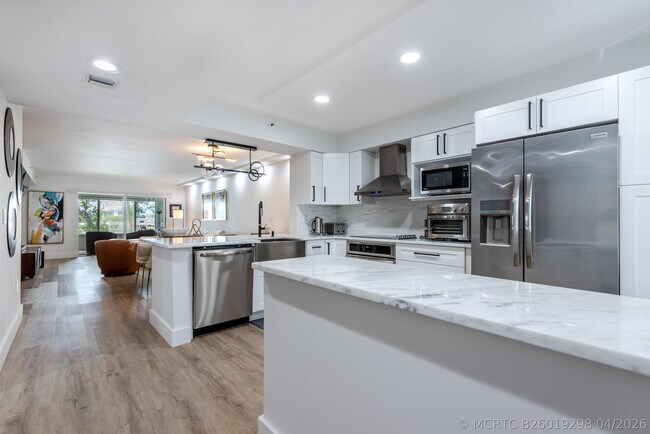 Building Photo - 6096 Huntwick Terrace Unit 303
