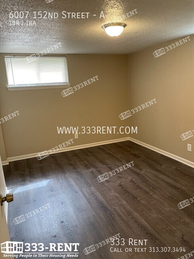 Photo - 6007 E 152nd St Unidad A